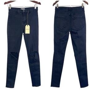 Vibrant ripped knee skinny jeans high-rise black stretch distressed 29